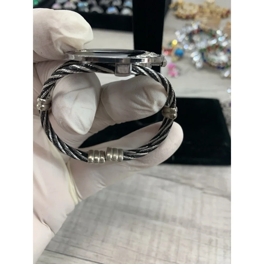 Dandy Watch Women's Silver Toned Black Cable Braided Bangle Analog Needs Battery